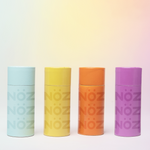 Load image into Gallery viewer, Collection of Nӧz sunscreen sticks in four available colors. 
