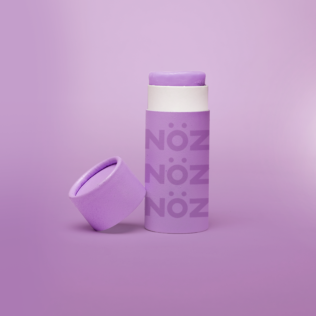 Nӧz sunscreen stick in orchid purple.